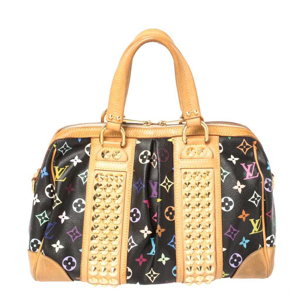 This edgy Courtney bag from Louis Vuitton is named after rock'n'roll star Courtney Love. Sure to stand out, the bag is crafted from iconic multicolor monogram canvas and is styled with leather trims. The bag comes with dual handles and golden studs