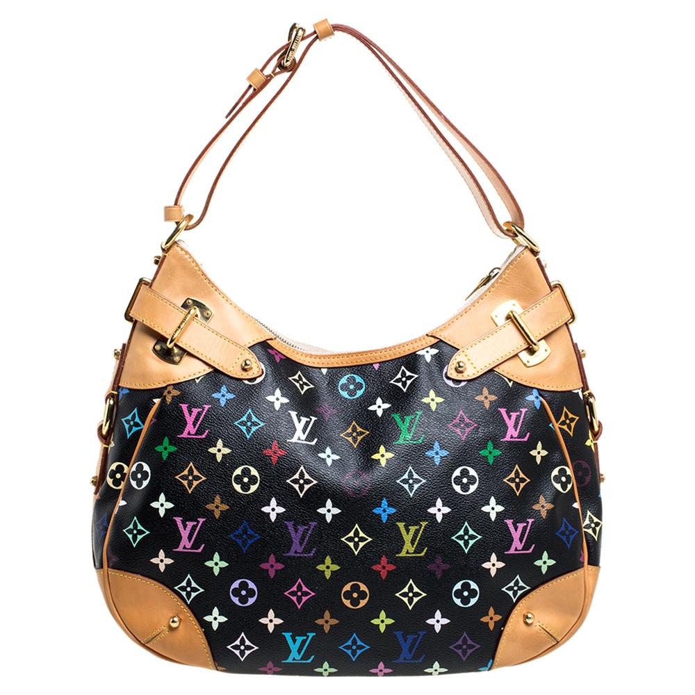 It is every woman's wish to own a Louis Vuitton handbag as fabulous as this one. Crafted from their signature multicolor monogram canvas, this bag features a single handle, a top zipper, and gold-tone hardware. While the buckle details elevate its