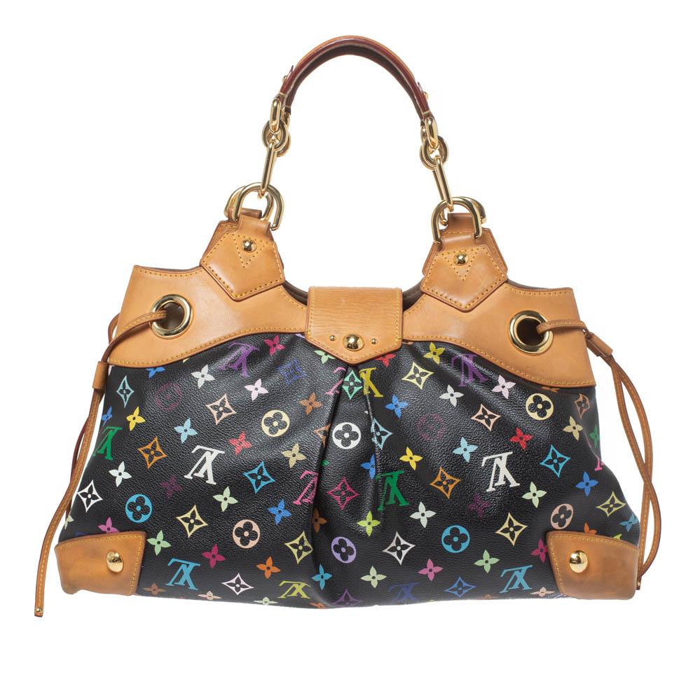 Anyone would want to own a Louis Vuitton handbag as gorgeous as this one. Crafted from coated canvas and leather, this bag features dual handles and a front flap with push-lock closure. While the string detail on the sides elevates its beauty, the