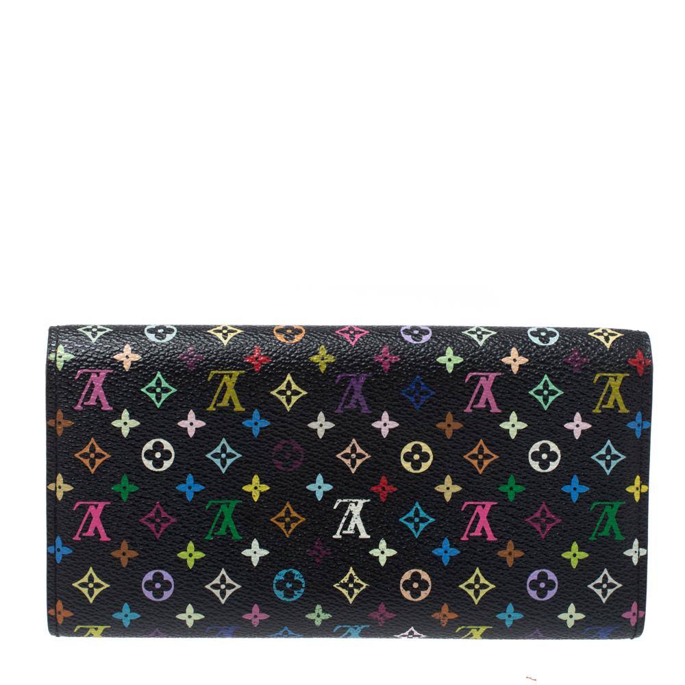 One of the most famous wallets by Louis Vuitton is Sarah. This one here comes made from Multicolor monogram canvas and the button on the flap opens to an interior with multiple card slots and a zip pocket. Perfect in size, this wallet can easily fit