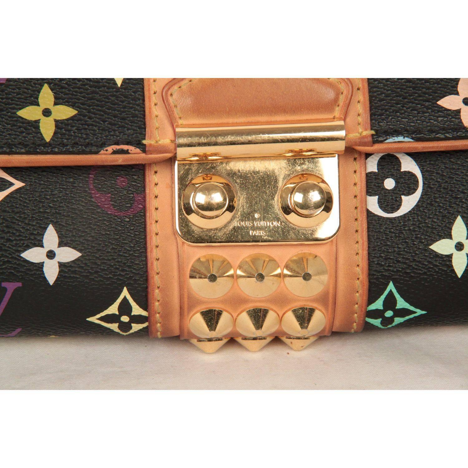 - LOUIS VUITTON 'Courtney' Clutch Bag in Black 'Multicolore' monogram canvas, from the Takashi Murakami Collection.
- Tan leather trim 
- Gold metal spike detaling
- Named after famous rock star Courtney Love
- Flap with push lock closure
- Taupe