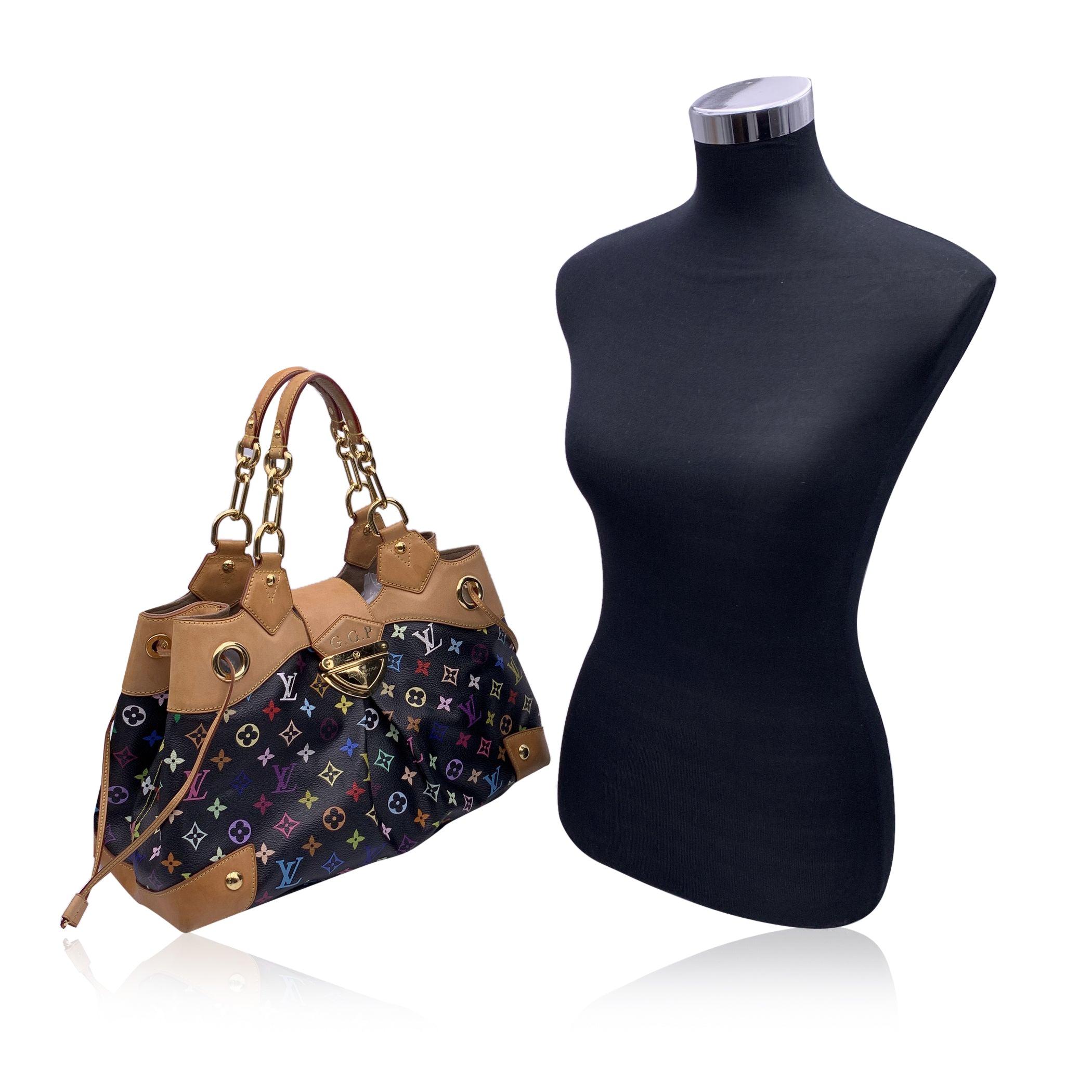 This beautiful Bag will come with a Certificate of Authenticity provided by Entrupy. The certificate will be provided at no further cost. Elegant 'Ursula' bag by Louis Vuitton, in black Monogram Multicolore canvas, designed by Takeshi Murakami.