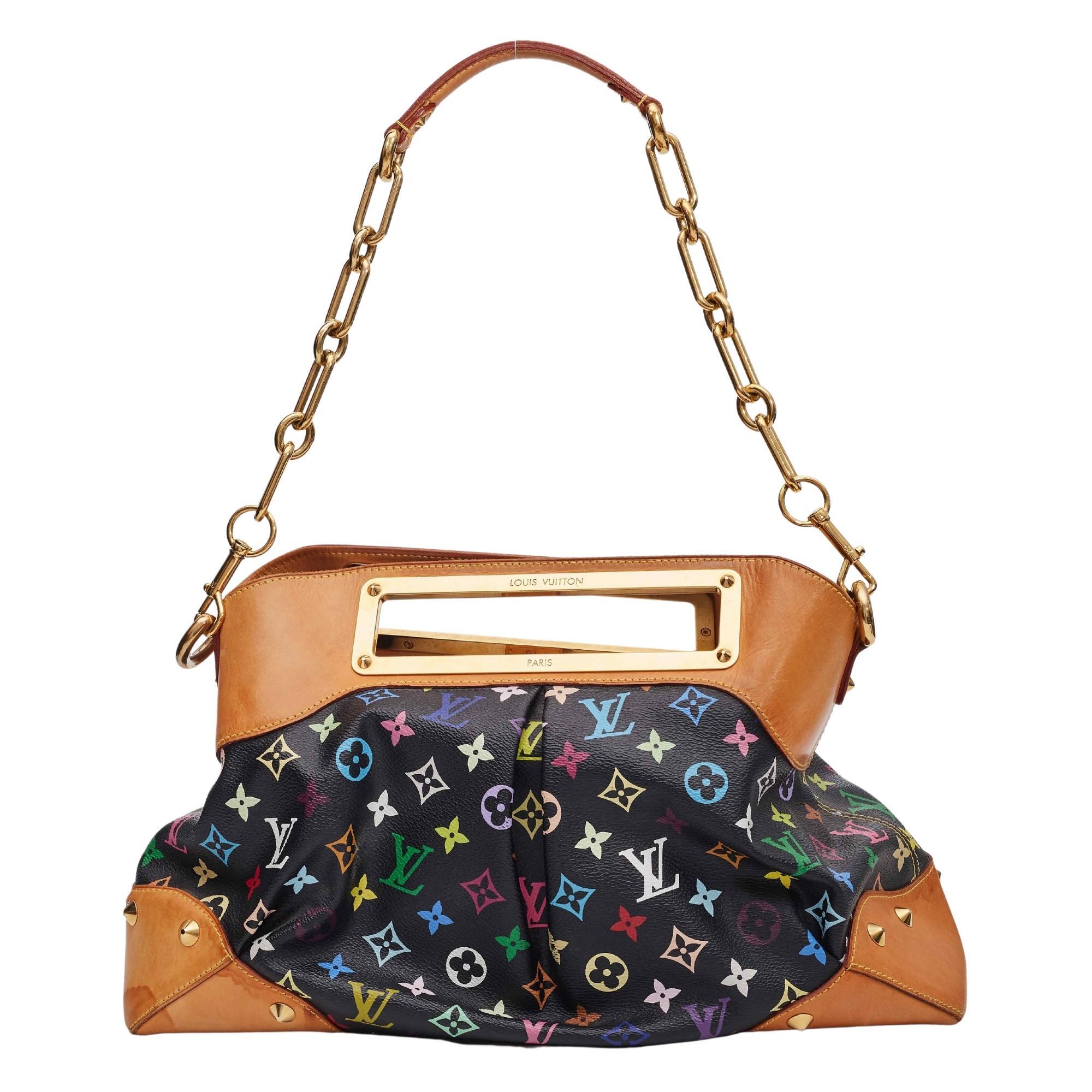 Louis Monogram Multicolor Judy GM in Black. This bag is made of multicolour Louis Vuitton monogram in 33 vivid colors on black toile canvas. This bag features vachetta cowhide leather base corners and a 