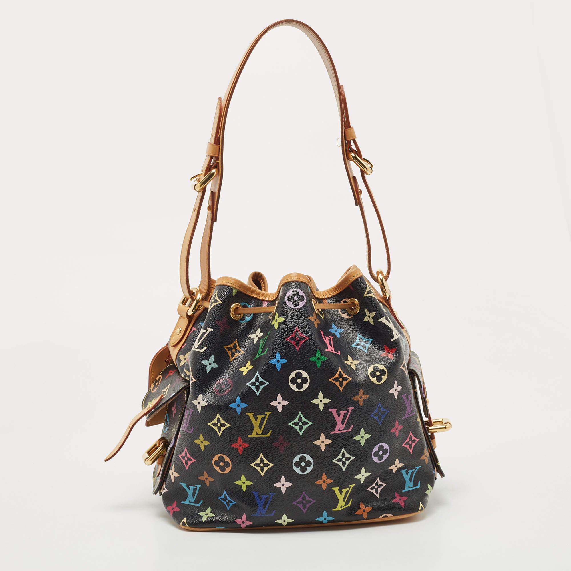 Created in 1932 by Louis Vuitton to carry bottles of Champagne, the iconic Noe now serves as a stylish daytime handbag. Crafted from Multicolor Monogram leather, the white bag exudes just the right amount of sophistication. It has a single