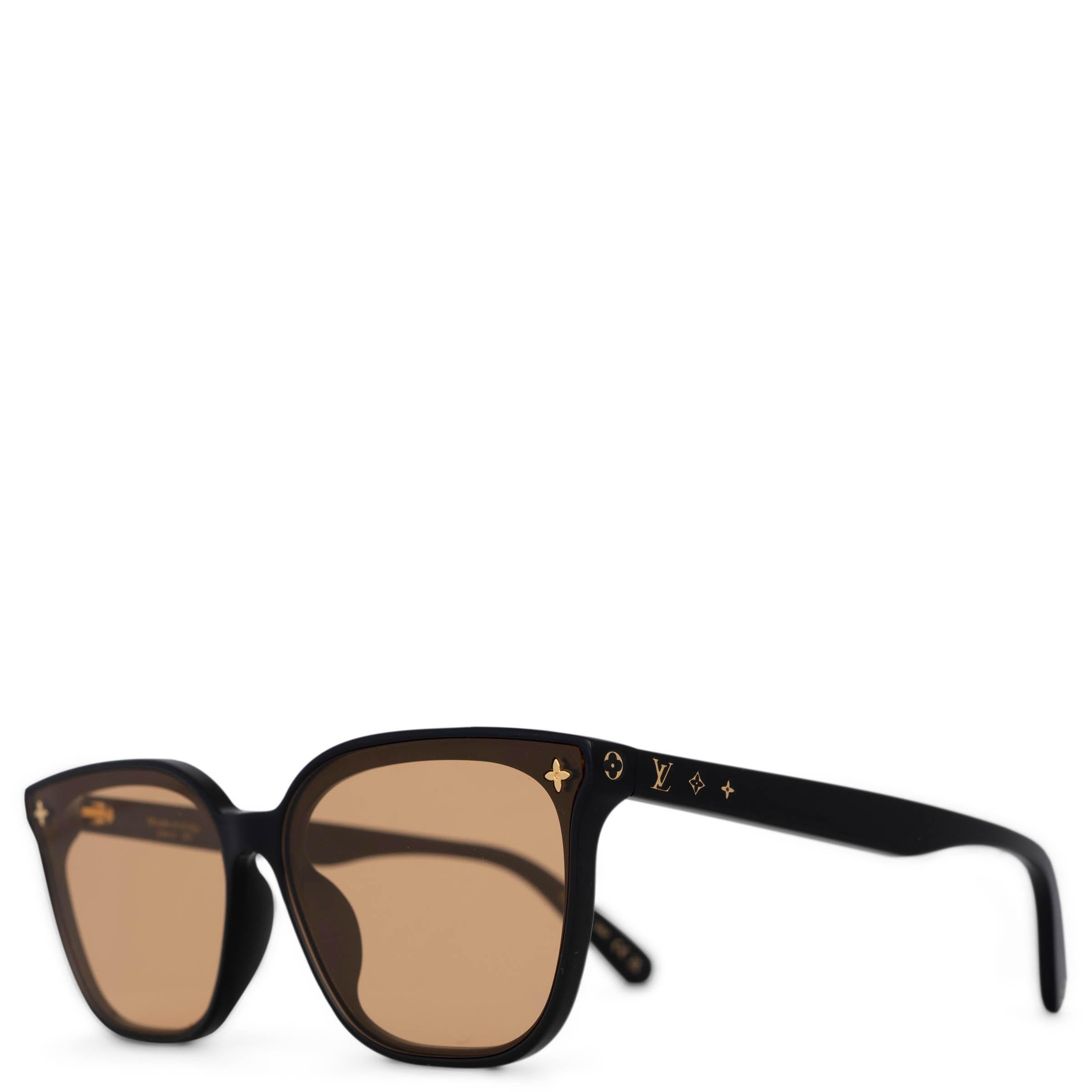 These 100% authentic Louis Vuitton My Monogram Fame rectangular sunglasses are crafted from sleek black acetate and feature striking yellow lenses. The design incorporates the iconic Louis Vuitton flowers and initials in the frame and temples, with