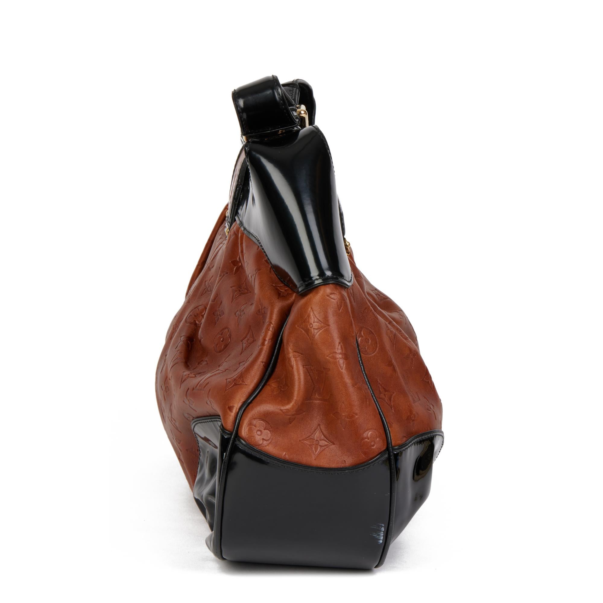 t monogram patent embossed studio bag