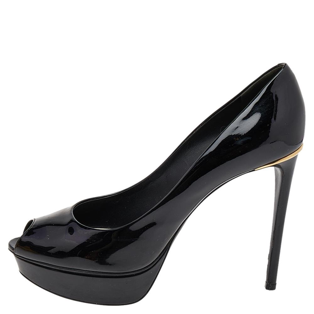 Look smart and stylish in this pair of Eyeline pumps, designed from patent leather. Unleash the smart look with this pair of shoes designed by Louis Vuitton. The pair is styled with platforms, high heels, and peep toes. Ideal for formal events, this