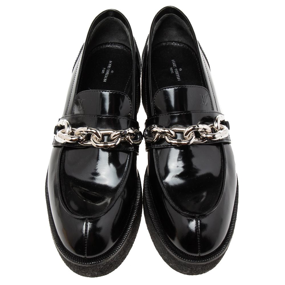 Functional and stylish, Louis Vuitton's collections capture the effortless, nonchalant finesse of the modern you. Crafted from patent leather in a black shade, these loafers are so comfortable you'll never want to take them off. They are topped with