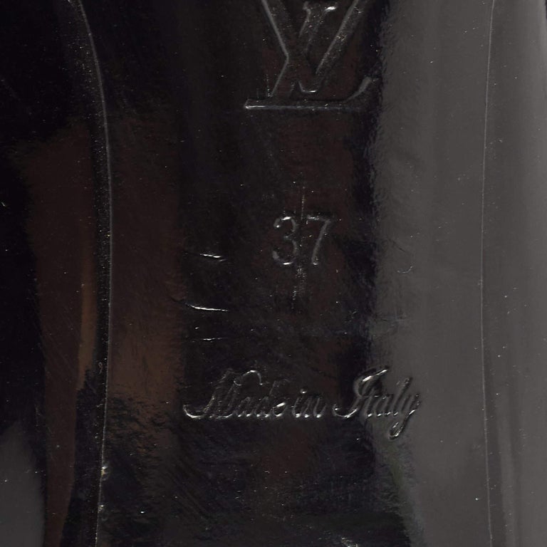 LOUIS VUITTON 2022 black LV logo monogram cape two way parka cape coat FR38  M For Sale at 1stDibs