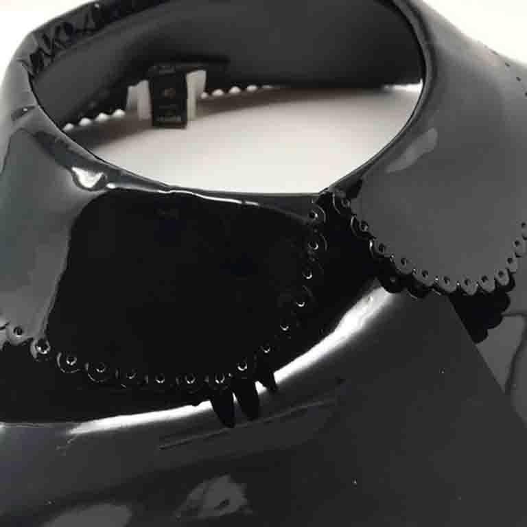 From the 2011 Fetish Collection this collar was worn with sheer blouses

Marc Jacobs Collection for Louis Vuitton
No box No Dust Bag
Made in France
A few surface scratches a and bends
