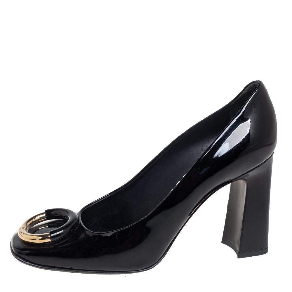 Known to add classy styles to highlight their creations, these pumps from Louis Vuitton pose a style you certainly don't want to miss. These pumps display black patent leather on the exterior and feature square-toes, decorative accents, and block