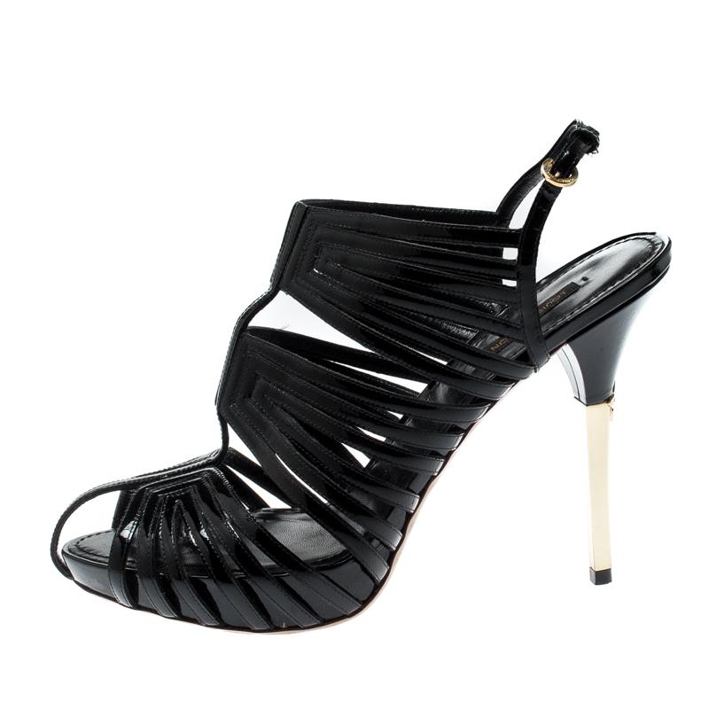 Strut your way in style and dazzle the crowds with these fabulous sandals from Louis Vuitton. These beauties are crafted from patent leather and feature ankle straps. They come equipped with leather lined insoles and solid platforms offering maximum