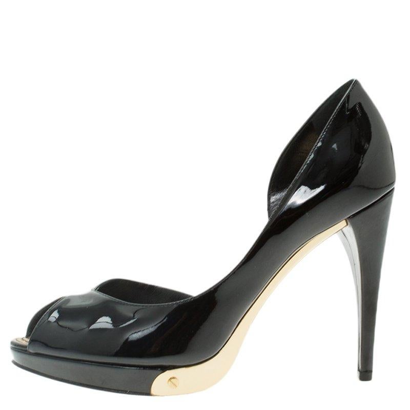 This pair of D’Orsay pumps coming from Louis Vuitton will offer you a perfect business look. Crafted from black patent leather, they come with peep toes and cut-out details and are accented with silver-tone detailing. Elevated on 11cm well-suited