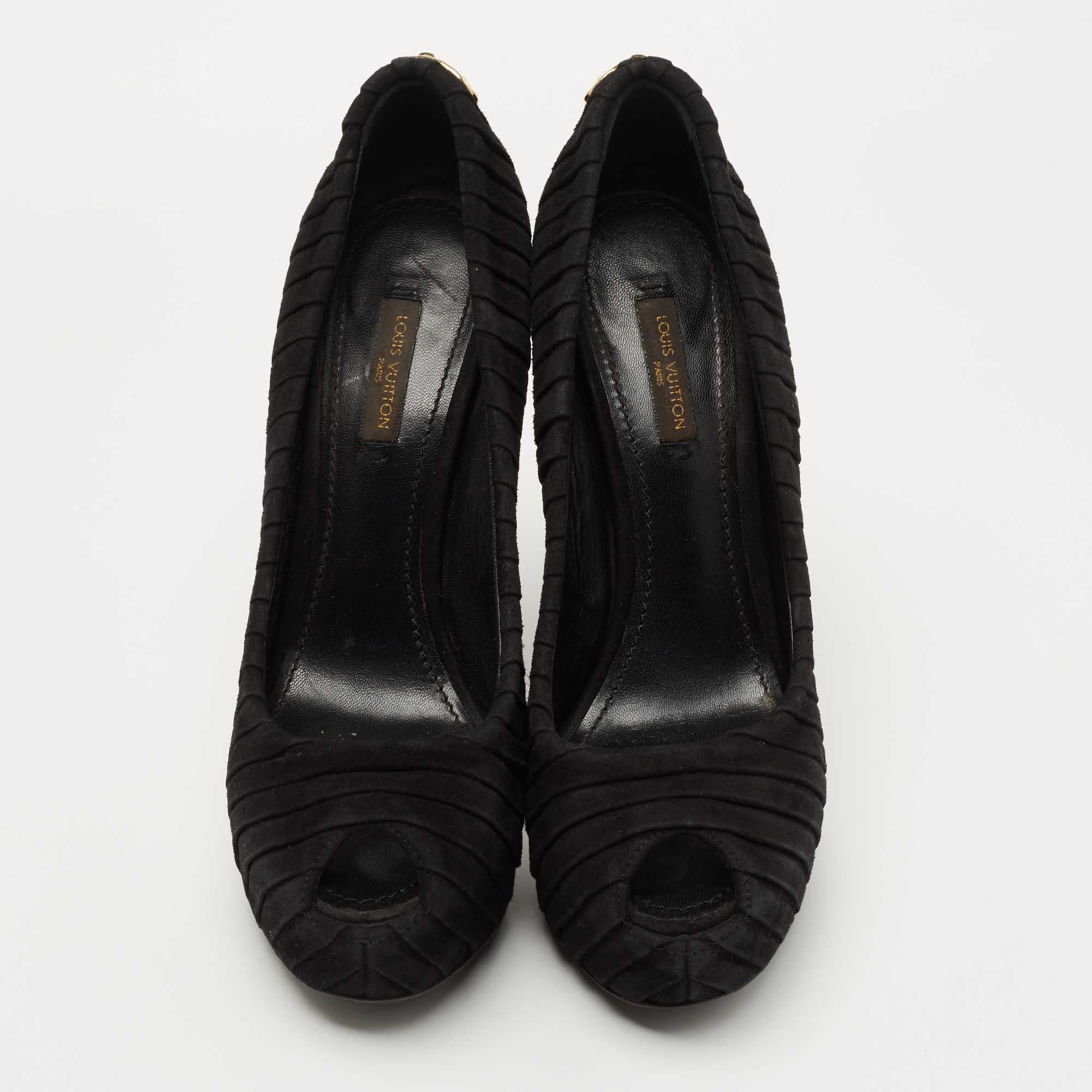 Exhibit an elegant style with this pair of pumps. These designer pumps are crafted from quality materials. They are set on durable soles and high heels.