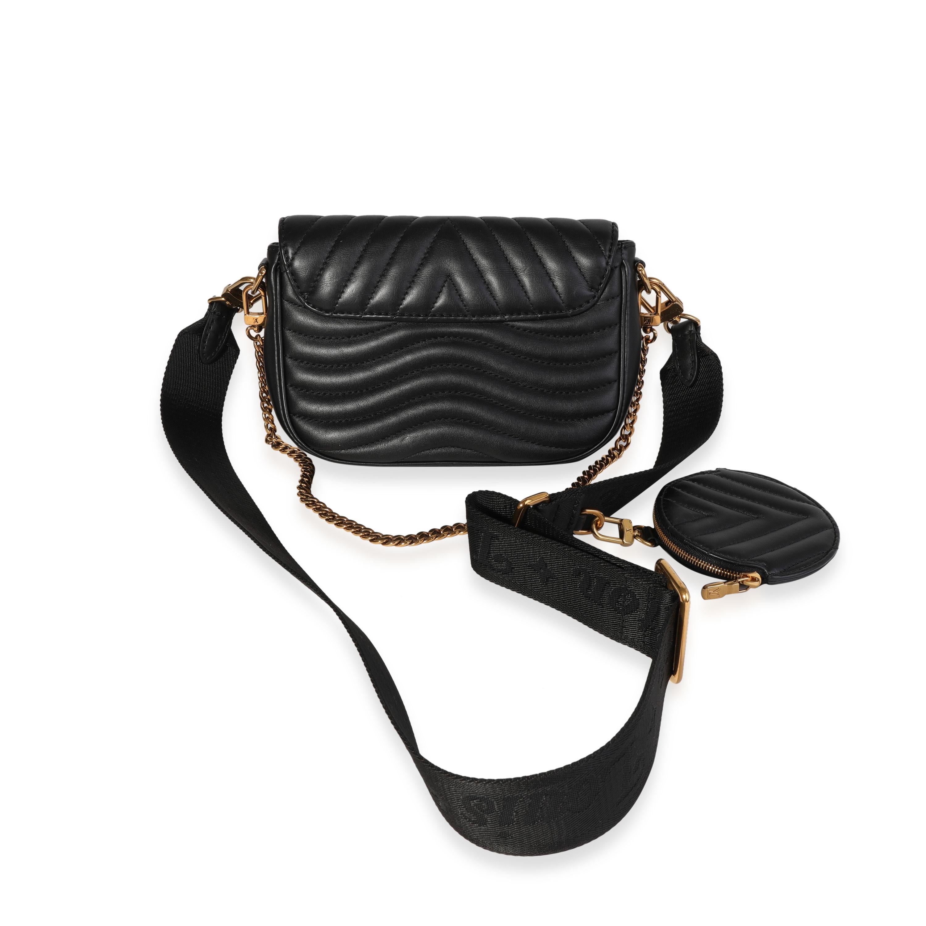 Listing Title: Louis Vuitton Black Quilted Leather New Wave Multi-Pochette
SKU: 120242
MSRP: 2710.00
Condition: Pre-owned 
Handbag Condition: Very Good
Condition Comments: Scratches and stains on interior
Brand: Louis Vuitton
Model: New Wave