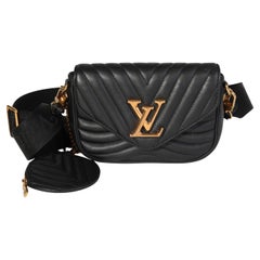 Schwarze gesteppte New Wave Multi-Pochette aus Leder von Louis Vuitton