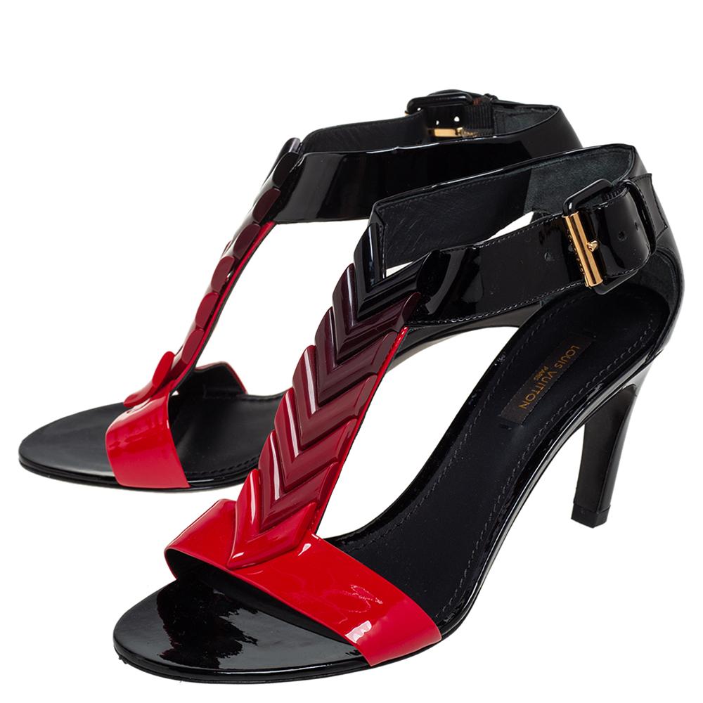 These Bright Shades sandals designed by Louis Vuitton inspire you to be boldly beautiful. The upper has a T-strap made from red-black patent leather, which shows an attractive ombre pattern with distinct gold-toned fittings. These sandals are