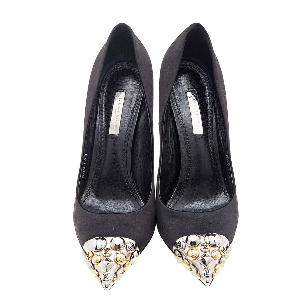 These Bernice pumps from the House of Louis Vuitton will help you take every step with confidence and style! They are crafted using black satin, with studded embellishments on their toes. They showcase a slip-on style, two-tone metal hardware, and