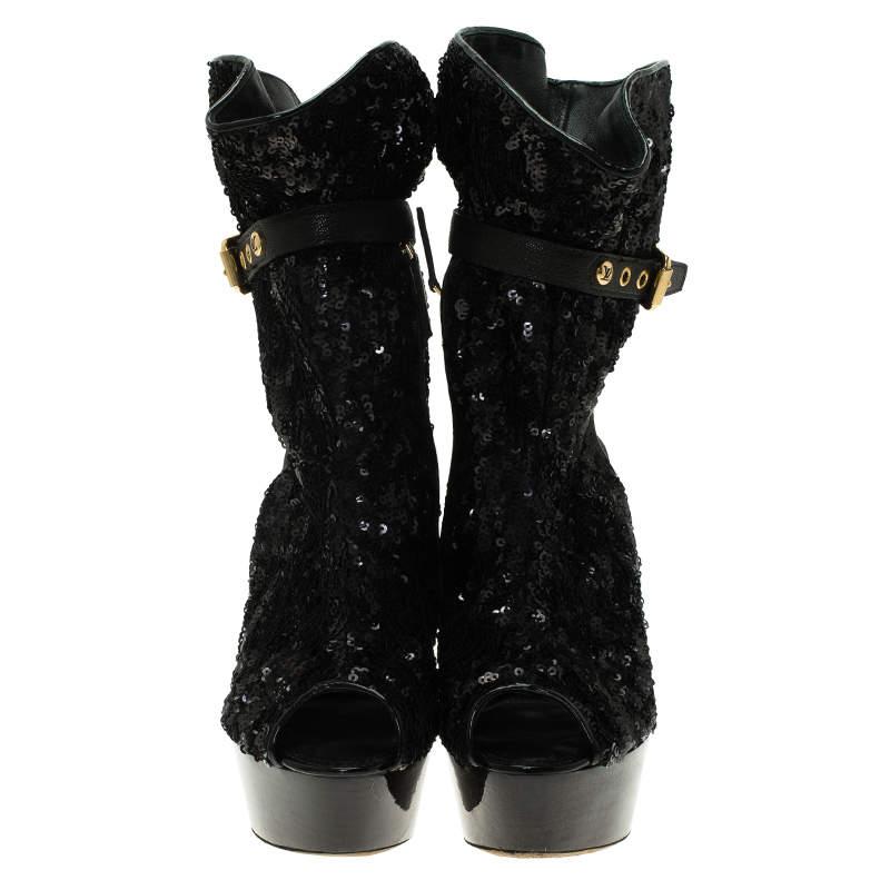 If you are a shoe lover, then this pair is for you. Whether you prefer classic or edgy, these Louis Vuitton sequins boots are perfect for a night out. The booties come with black sequins embroidered throughout. They feature leather ankle straps with