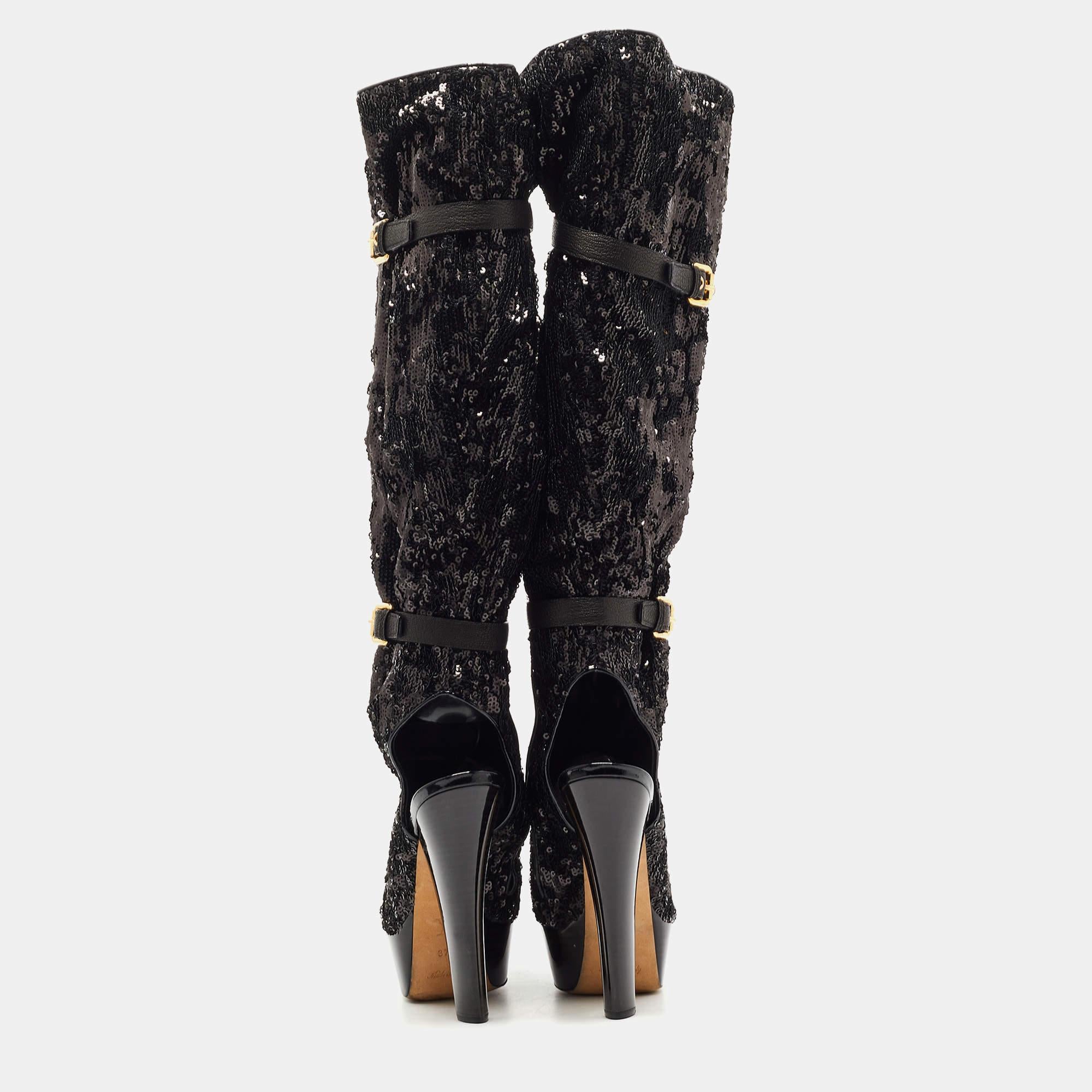 Nail a confident look with these designer boots from Louis Vuitton! They're covered in sequins and added with peep toes, platforms, and 14 cm heels.


