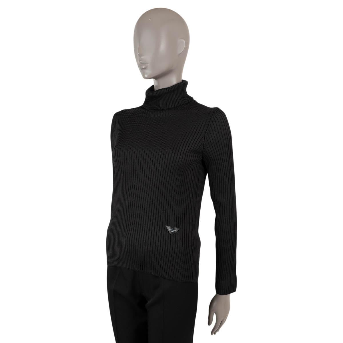 100% authentic Louis Vuitton turtleneck sweater in black rib-knit silk (100%) with a triangle logo on the front. Unlined. Has been worn and is in excellent condition.

2017 Fall/Winter

Measurements
Model	RW172B FFX FDKL61
Tag Size	M
Size	M
Shoulder