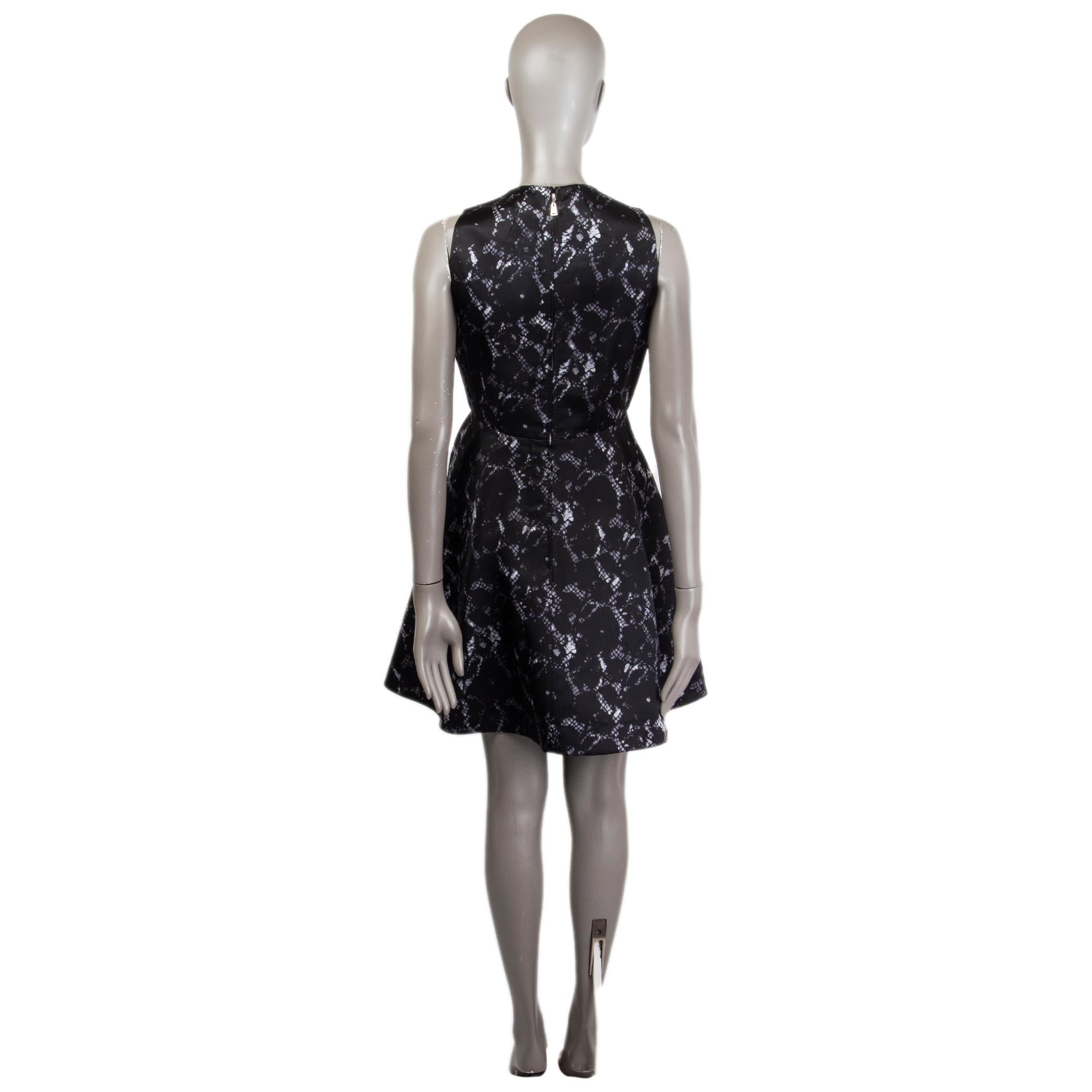 LOUIS VUITTON Schwarzes SNAKE PRINT FLARE Cocktailkleid aus Seide 38 im Zustand „Hervorragend“ im Angebot in Zürich, CH