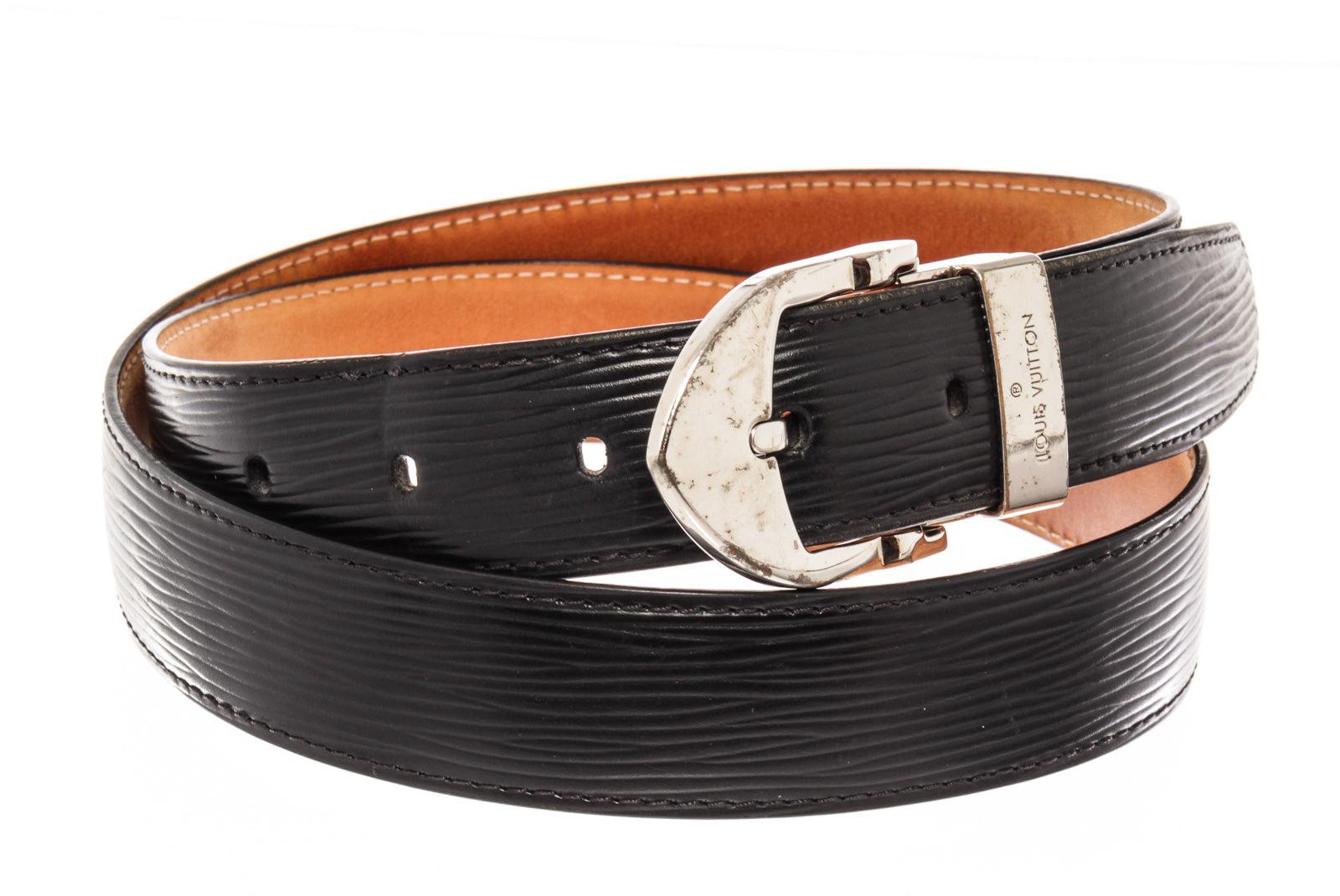 Louis Vuitton Black Silver Epi Leather Belt with leather, tan vachetta leather, turn lock closure.
61248MSC