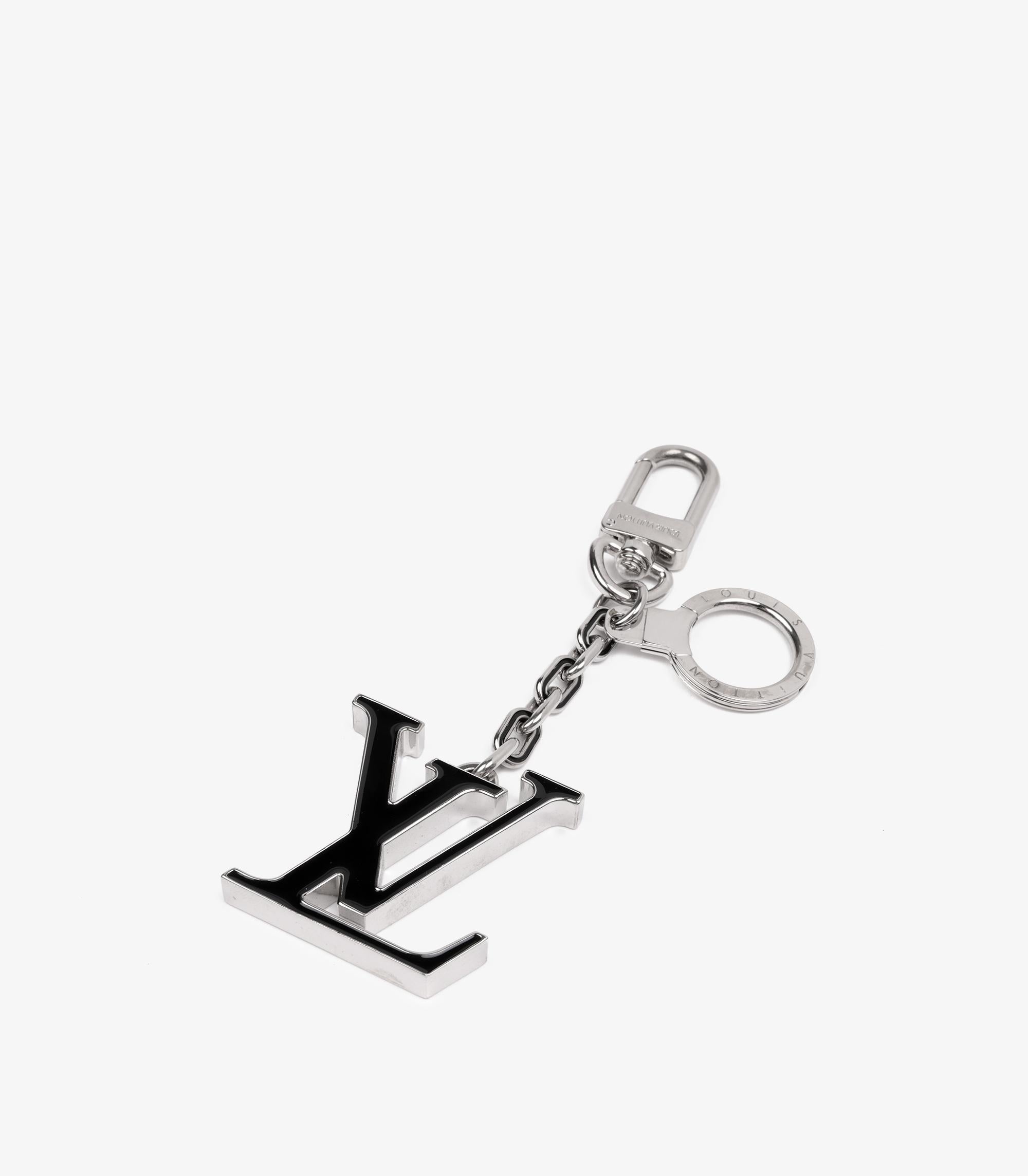Louis Vuitton Black & Silver Tone LV Initiales Bag Charm Keyring

Product Details
Xupes Ref: CAA0101
Brand: Louis Vuitton
Model: LV Initiales Bag Charm Keyring
Type: Charm, Keyring 
Serial Number: DPQ111
Age: 2011
Accompanied By: Louis Vuitton Dust