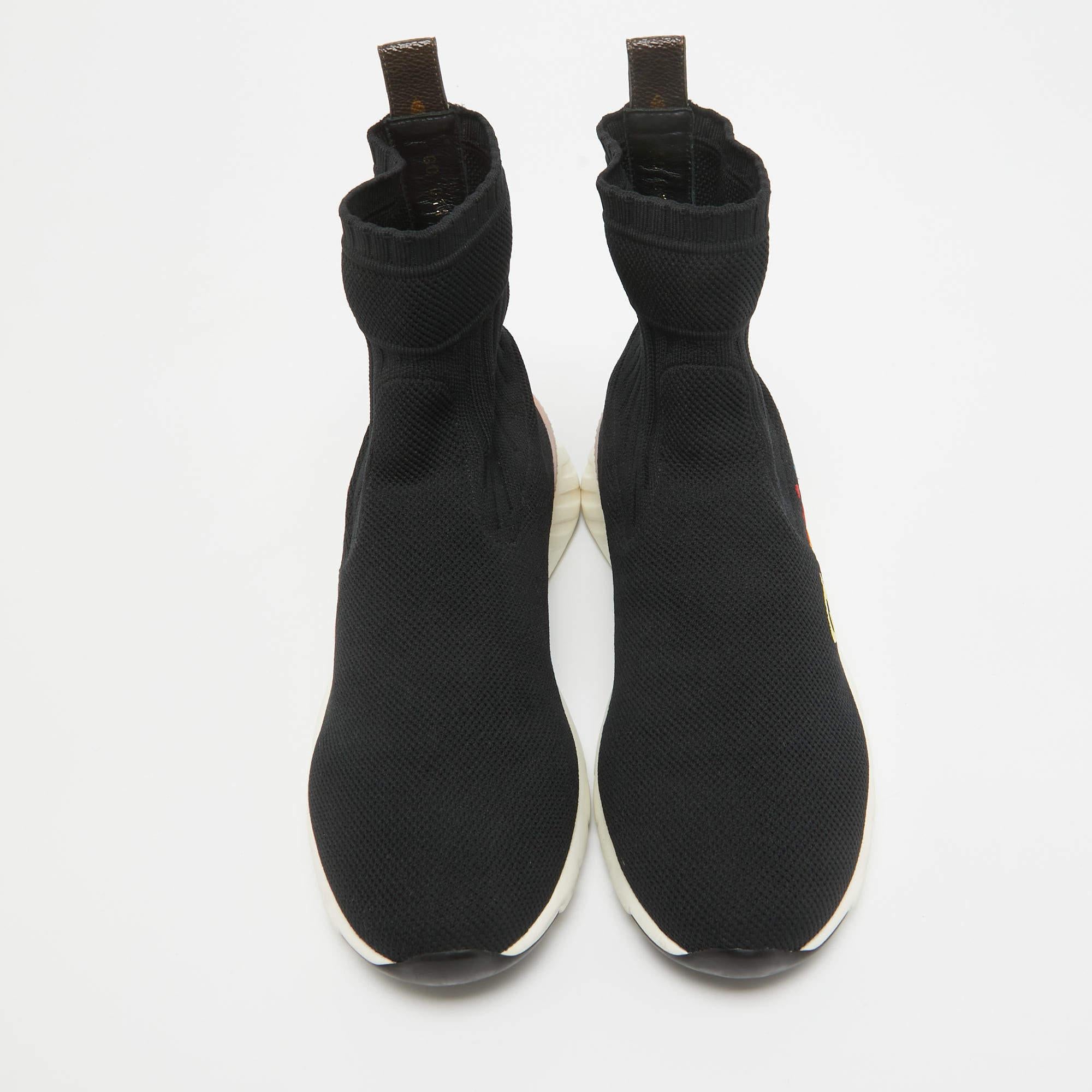 Coming in a classic silhouette, these designer sneakers are a seamless combination of luxury, comfort, and style. These sneakers are finished with signature details and comfortable insoles.

