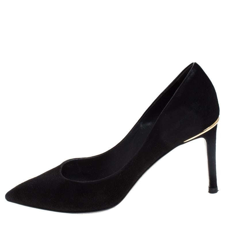 Add a contemporary touch to your look when you pair your outfit with these Louis Vuitton pumps. Coordinate your outfit with these suede pumps and have all eyes on you. This black pair feature pointed toes and gold-tone metal detailing with the 8.5