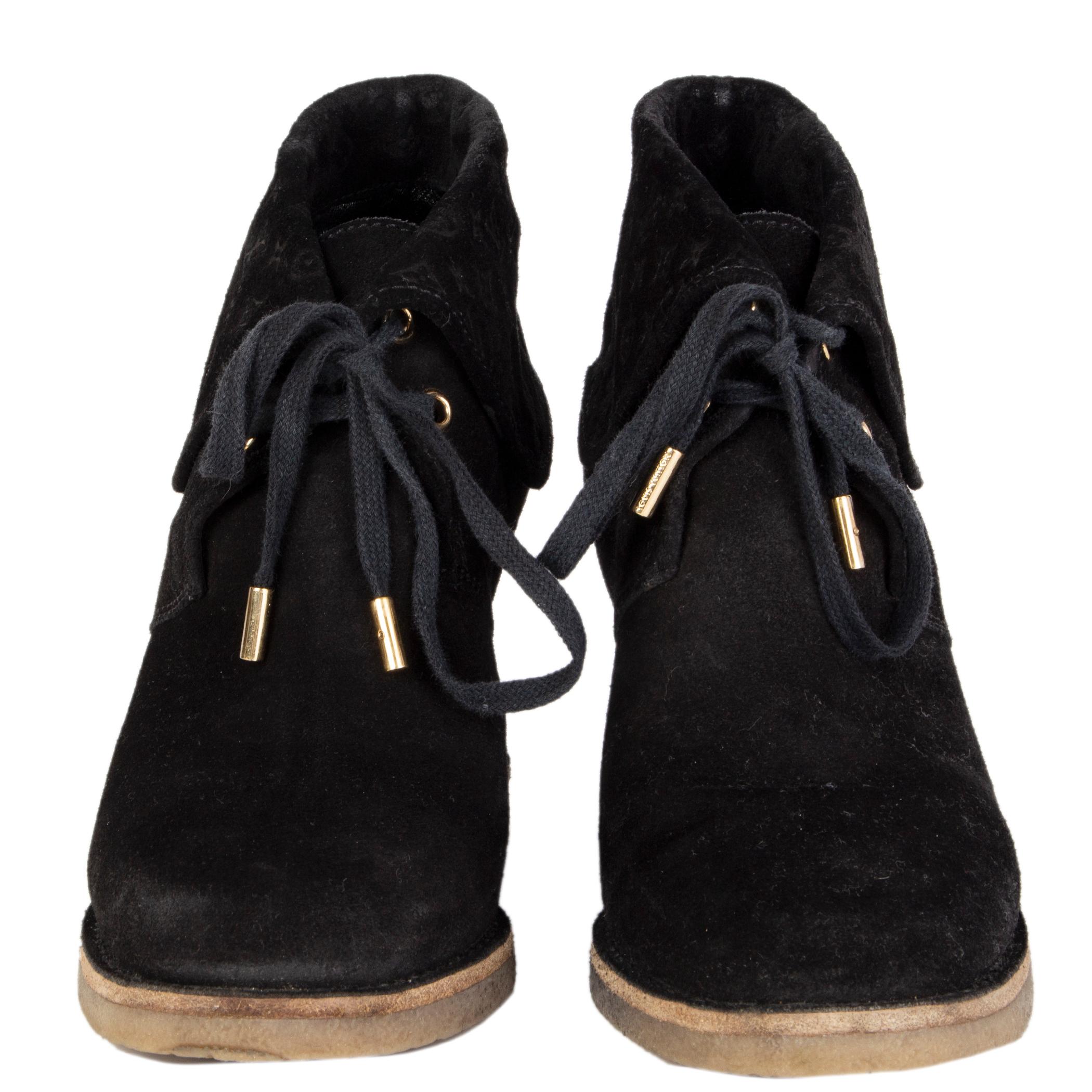 100% authentic Louis Vuitton Fauvist Low lace-up wedge ankle-boots in black suede with LV monogram embossed on the top part. Have been worn and are in excellent condition. Comes with dust bag. 

Measurements
Imprinted Size	36.5
Shoe Size	36.5
Inside