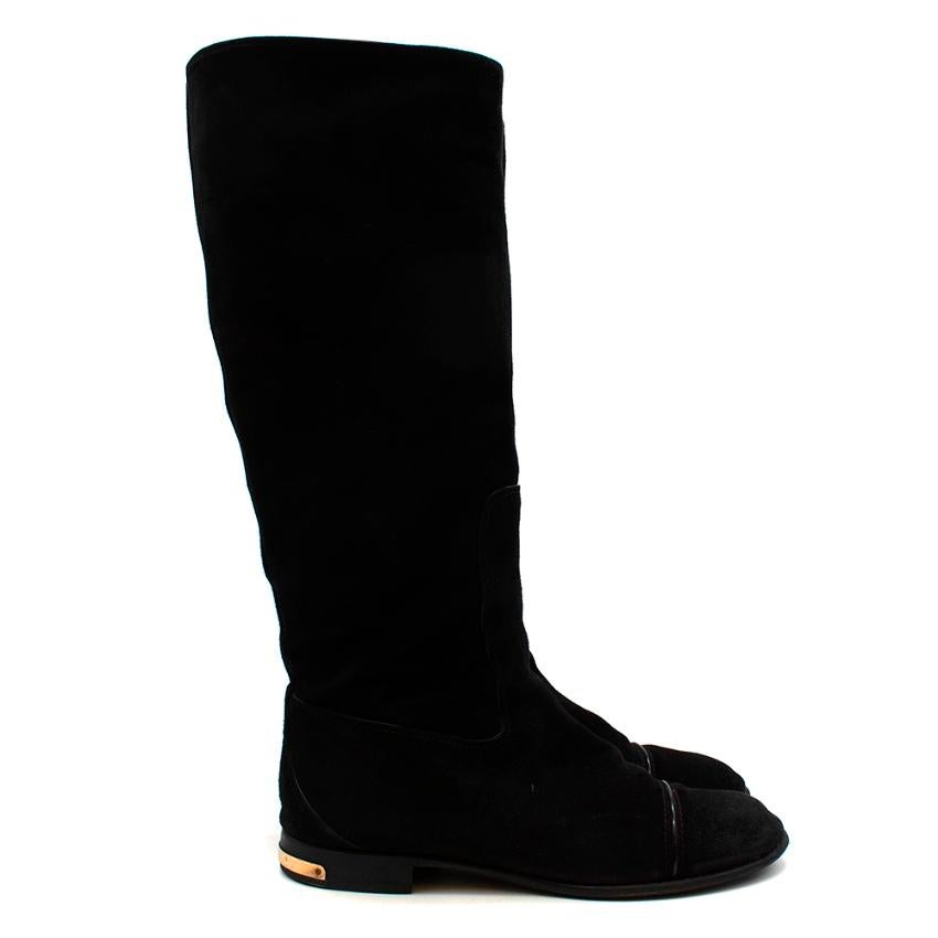 Louis Vuitton Black Suede Flat Boots

- Luxurious soft velvet like suede texture 
- Classic style 
- Neutral black hue 
- Branded gold tone plate to the heels 
- Round toes 
- Patent leather pipping detail to the toes 
- Soft leather lining 
-