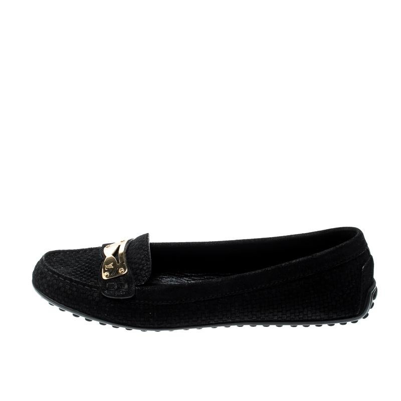 Stylish and super comfortable, this pair of loafers by Louis Vuitton will make a great addition to your shoe collection. They have been crafted from suede and styled with penny keeper straps. Leather insoles and rubber outsoles beautifully complete