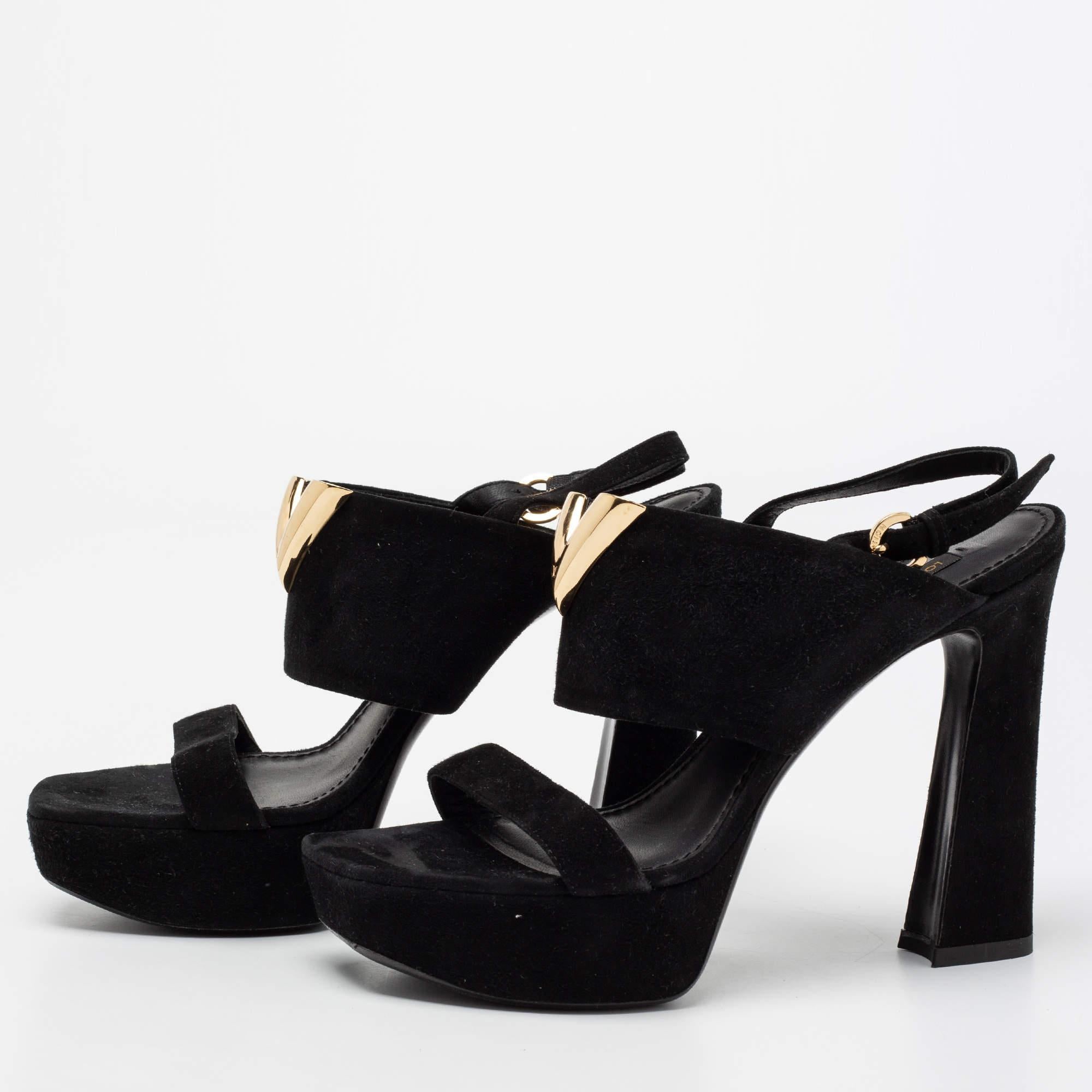 These Louis Vuitton sandals are effortlessly chic in a black shade. Created from suede, the V cut on the upper strap in gold-tone hardware elevates the silhouette, and these shoes are secured with a slingback closure. The platforms and 12cm heels of