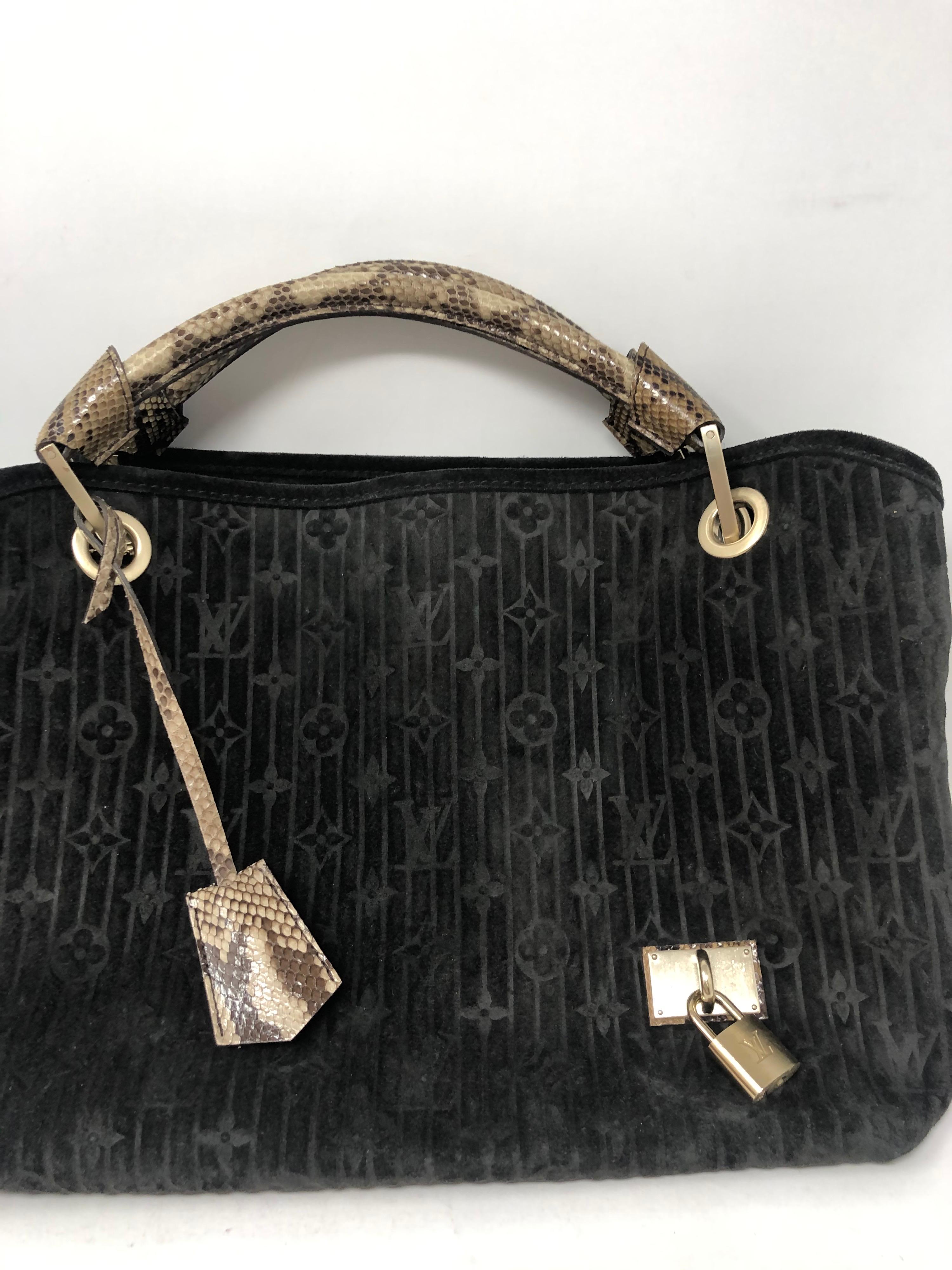 Louis Vuitton Black Suede Hobo Style Bag. Python handles. Rare and limited bag. Has gold lock and keys. Python clochette too. Gently worn. Lots of life left. Guaranteed authentic. 