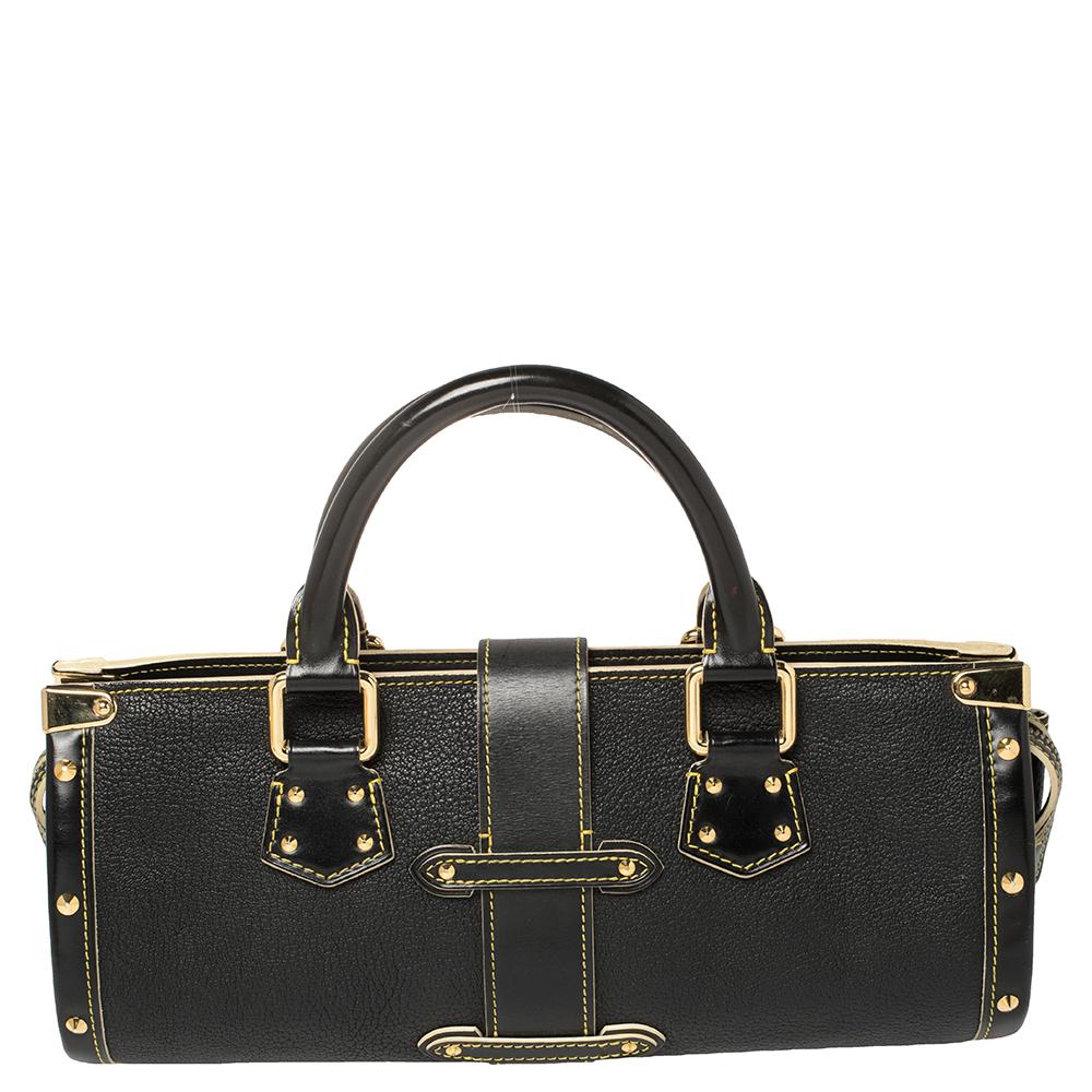 All of Louis Vuitton's handbags are high on style and craftsmanship. Created from Suhali leather, the L'Epanoui PM bag has a fine finish. The bag features two top handles, protective feet at the bottom and a roomy fabric interior secured by a flap