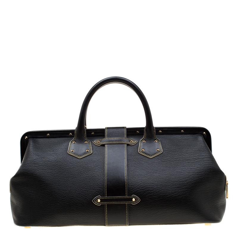 Now keep all your items highly organized and safe in this Louis Vuitton L'Ingenieux GM bag. Exhibiting impeccable style and sophistication, this lovely creation is crafted from classic black Suhali leather that exudes high grace from day to night.