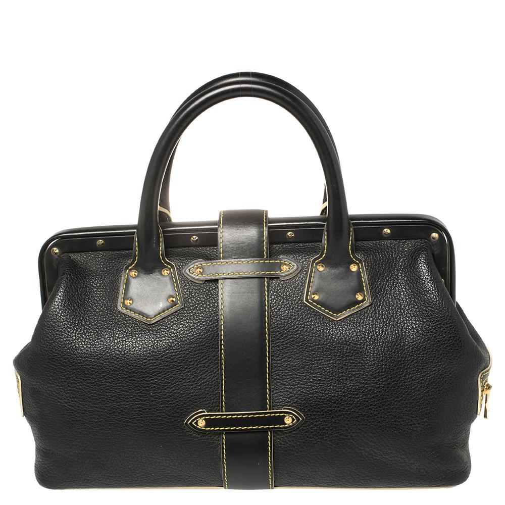 This Louis Vuitton Lingenieux PM bag is crafted to perfection. This black Suhali leather bag is adorned with gold-tone studs, a signature lock with the Louis Vuitton insignia, and side zip pockets. The interior is lined with fabric. The rolled