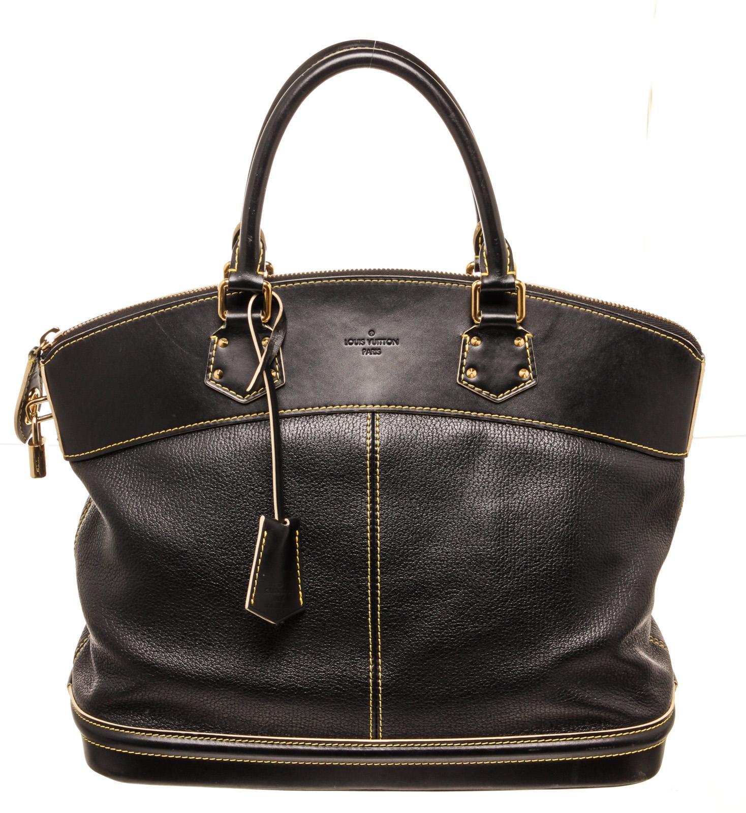 Louis Vuitton Black Suhali Leather Lockit MM Satchel Bag with suhali leather, brass hardware, dual rolled top handles, tonal jacquard lining, three pockets at interior; one with zip closure and zip closure at top. Includes dust bag, lock, keys, and