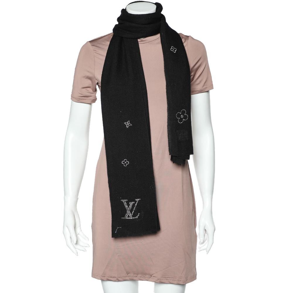 Louis Vuitton's Monte Carlo stole is made of cashmere and the black design is given a sparkling update with crystals forming LV's monogram symbols.

