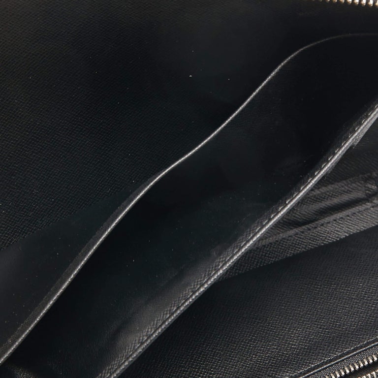 Louis Vuitton Black Taiga Atoll Travel Organizer Leather Pony-style  calfskin ref.182350 - Joli Closet