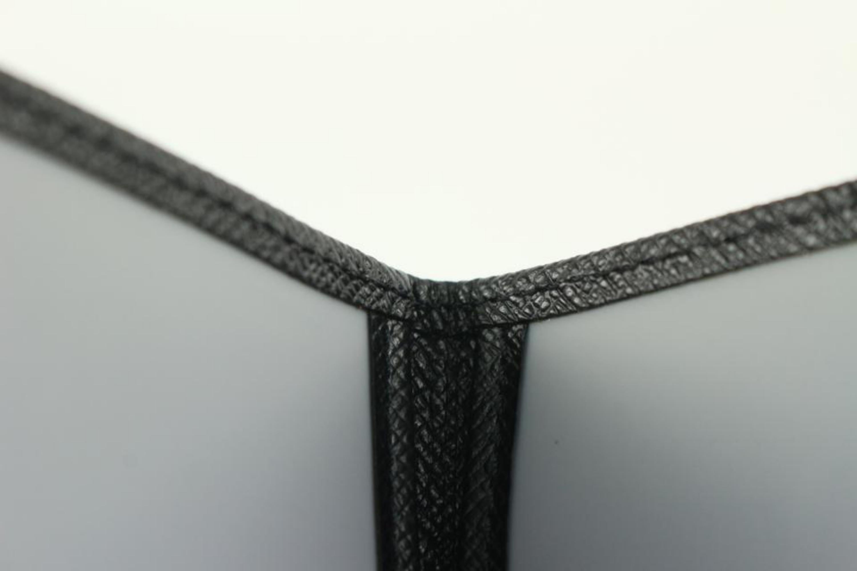 Louis Vuitton Porta carte di credito in pelle nera Taiga Custodia ID 1217lv20 in vendita 1