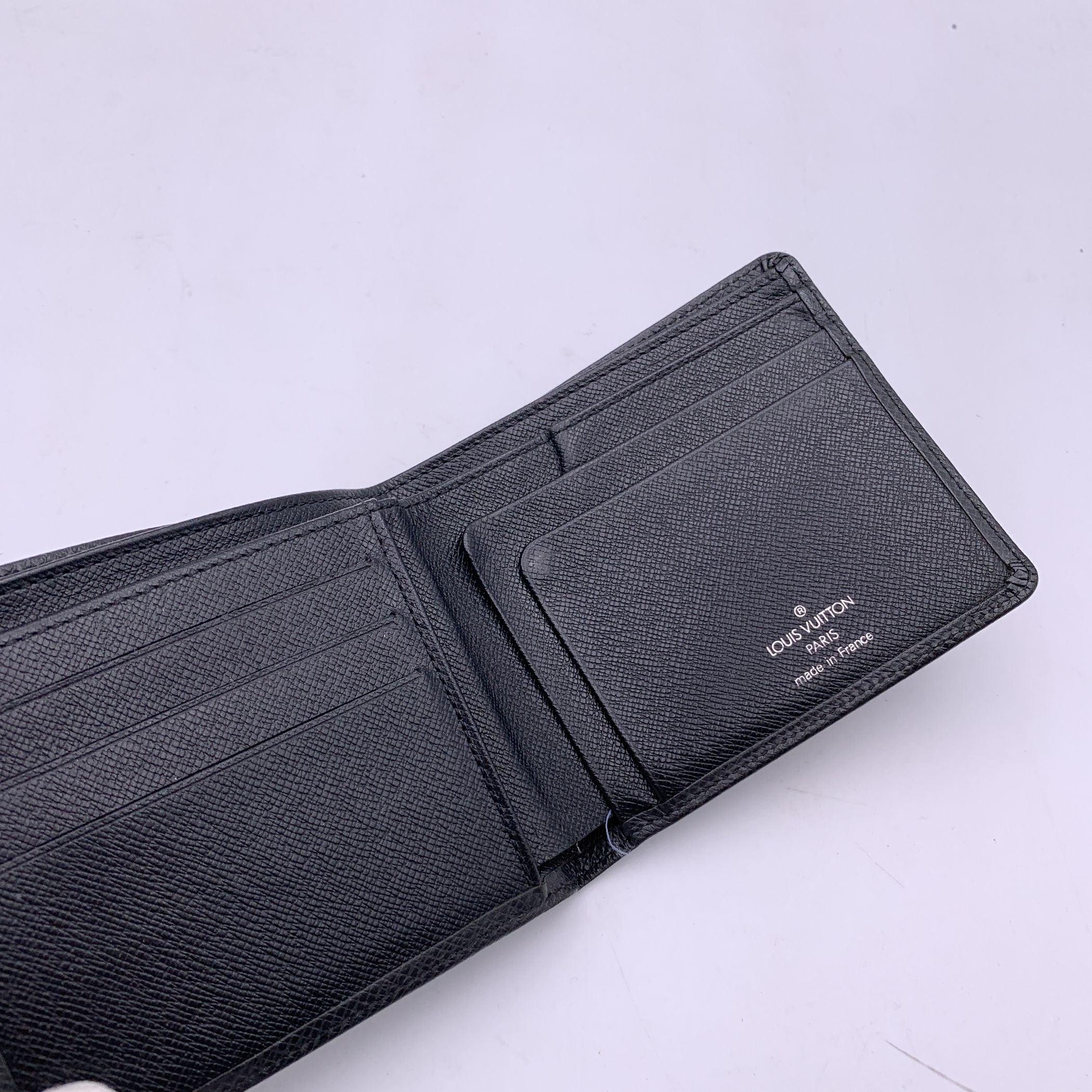 Women's or Men's Louis Vuitton Black Taiga Leather Cards and Bill Bifold Wallet