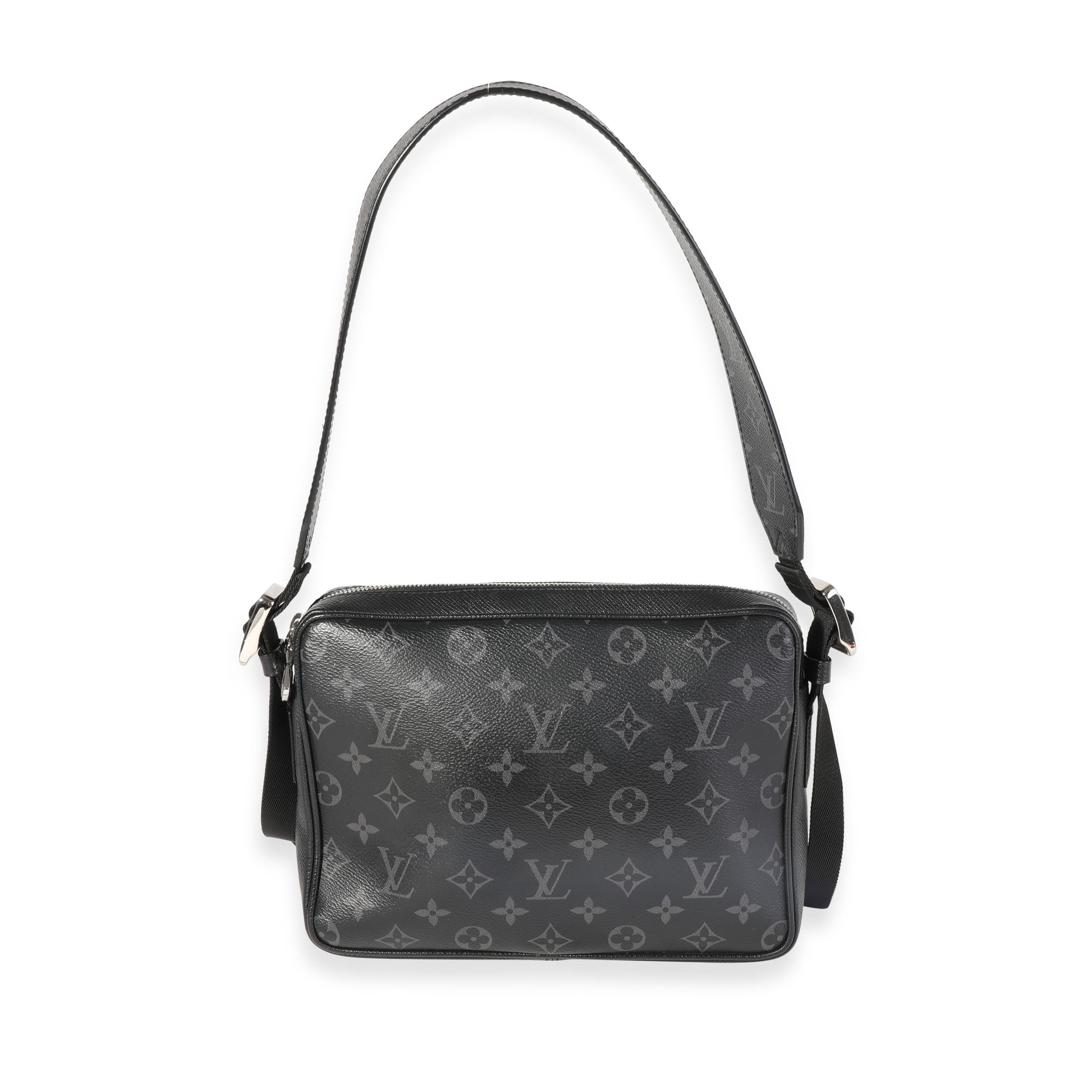 Listing Title: Louis Vuitton Black Taigarama & Monogram Eclipse Canvas Outdoor Messenger
SKU: 120220
MSRP: 2230.00
Condition: Pre-owned 
Handbag Condition: Very Good
Condition Comments: Very Good Condition. Faint wear to corners. Scratching to