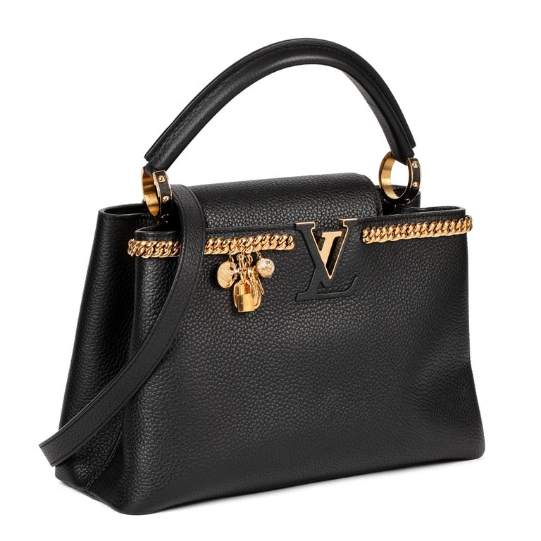 LOUIS VUITTON
Black Taurillion Leather Charm Capucines PM

Serial Number: SP0129
Age (Circa): 2019
Accompanied By: Louis Vuitton Dust Bag, Shoulder Strap, Box, Care Booklet
Authenticity Details: Date Stamp (Made in France)
Gender: Ladies
Type: Top