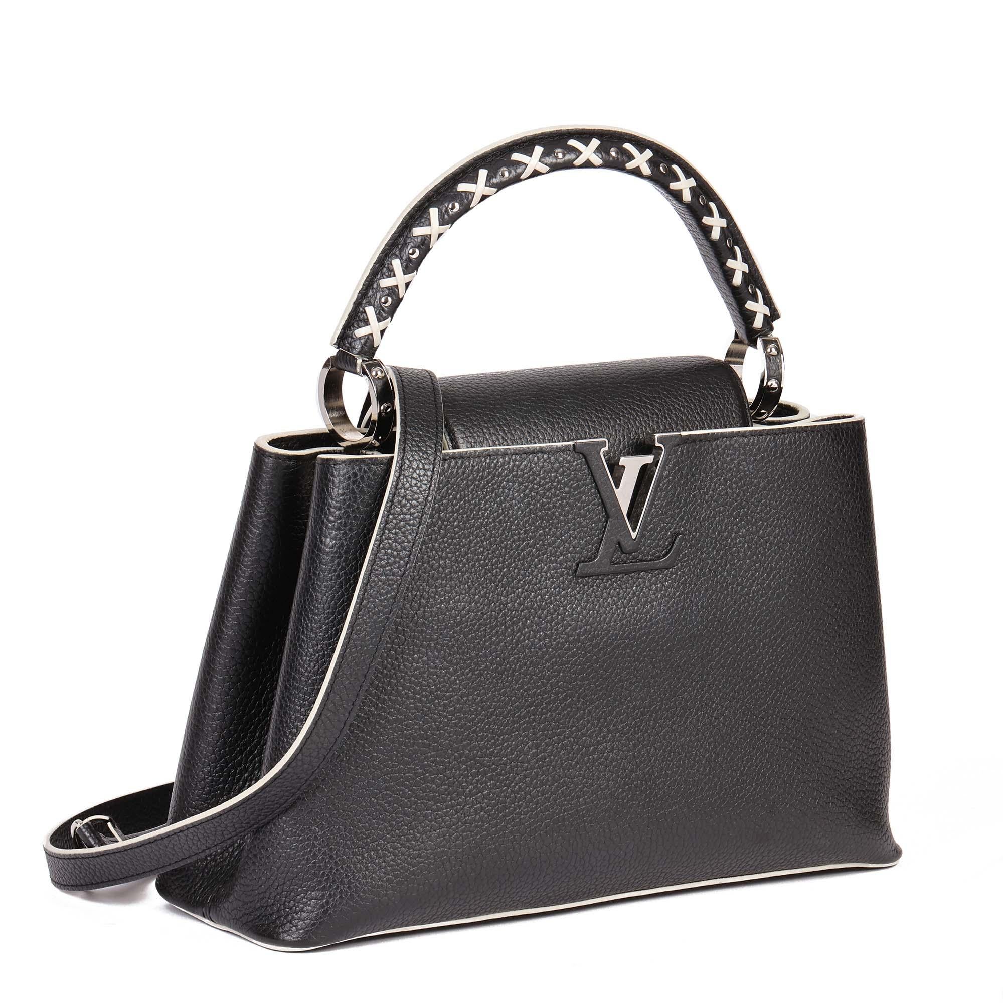 LOUIS VUITTON
Black Taurillion Leather & White Stitch Capucines PM

Serial Number: AH2148
Age (Circa): 2018
Accompanied By: Louis Vuitton Dust Bag, Shoulder Strap, Box, Care Booklet
Authenticity Details: Date Stamp (Made in France)
Gender: