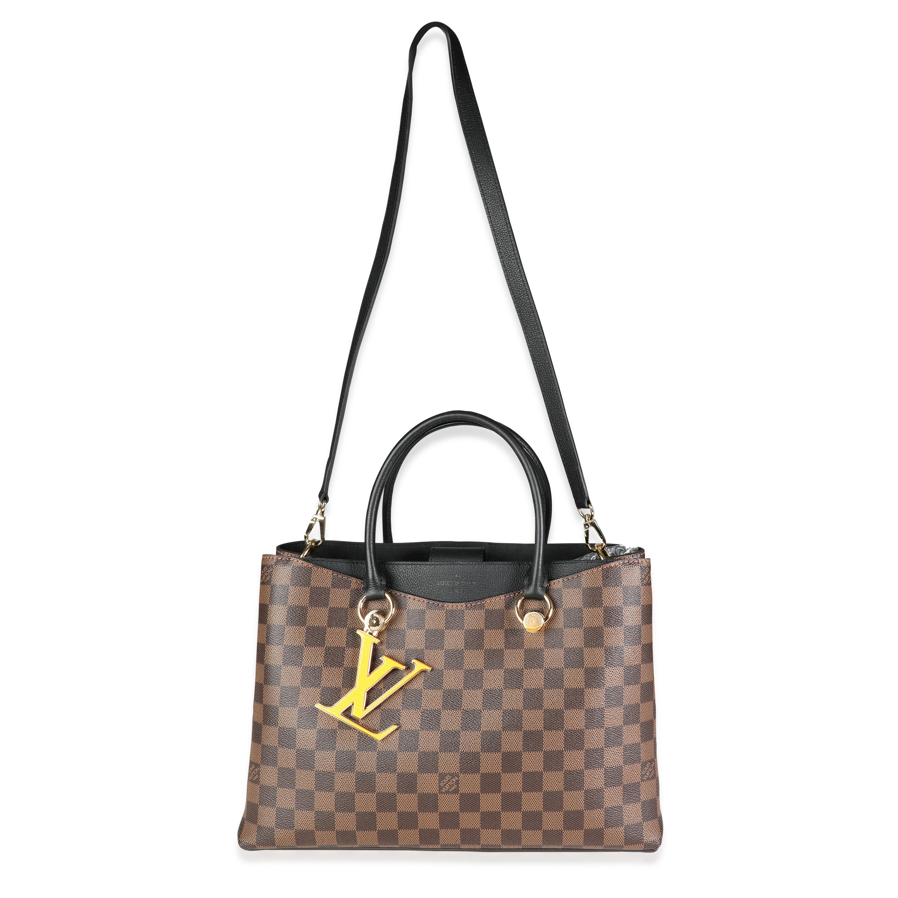 Listing Title: Louis Vuitton Black Taurillon Leather & Damier Ebene Canvas LV Riverside Tote
SKU: 117385
MSRP: 2800.00
Condition: Pre-owned (3000)
Handbag Condition: Excellent
Condition Comments: Very Good Condition. Plastic on some hardware.