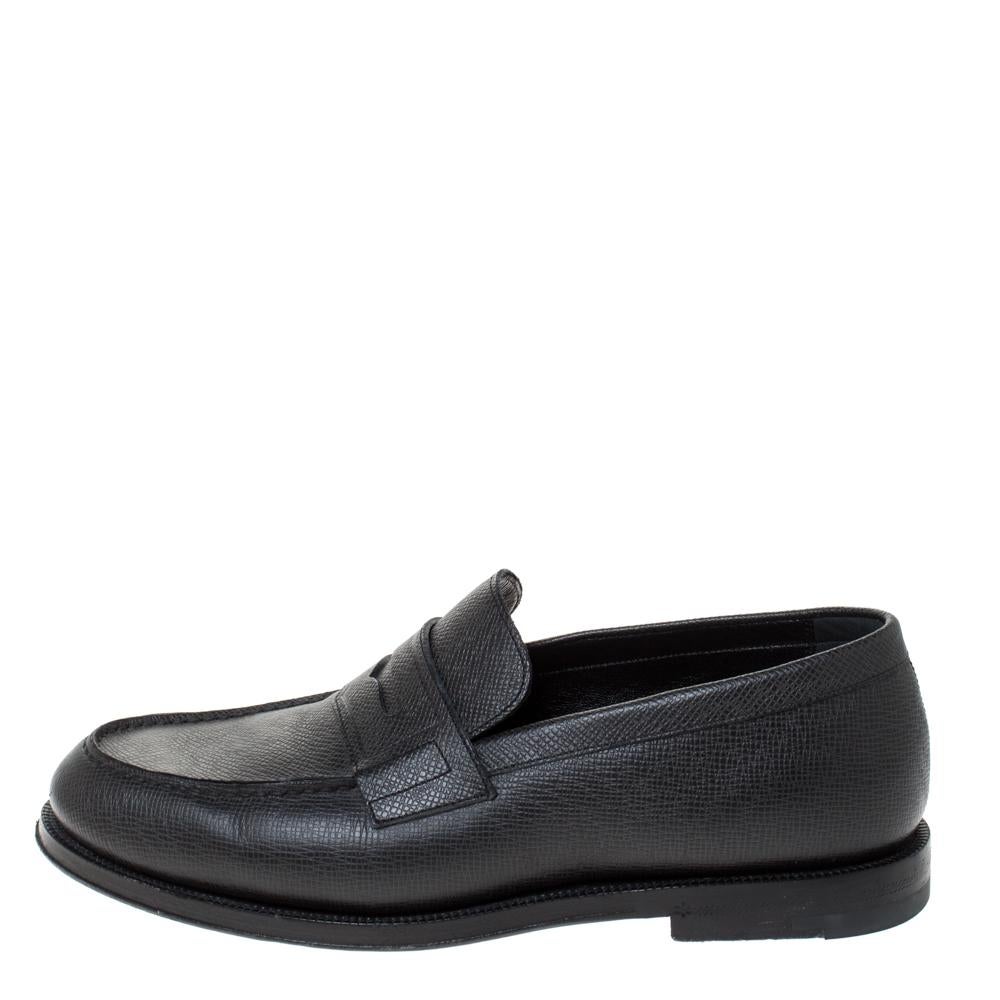 These black loafers made from textured leather reflect comfortable fashion and classic style. Designed to excellence, this pair is from the leading luxury house of Louis Vuitton, and it arrives with tough soles and penny keeper straps.

Includes: