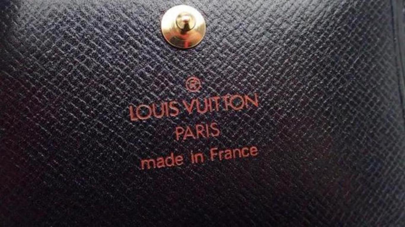 Women's Louis Vuitton Black ( Ultra Rare ) Epi Leather Trifold Wallet 213498 For Sale