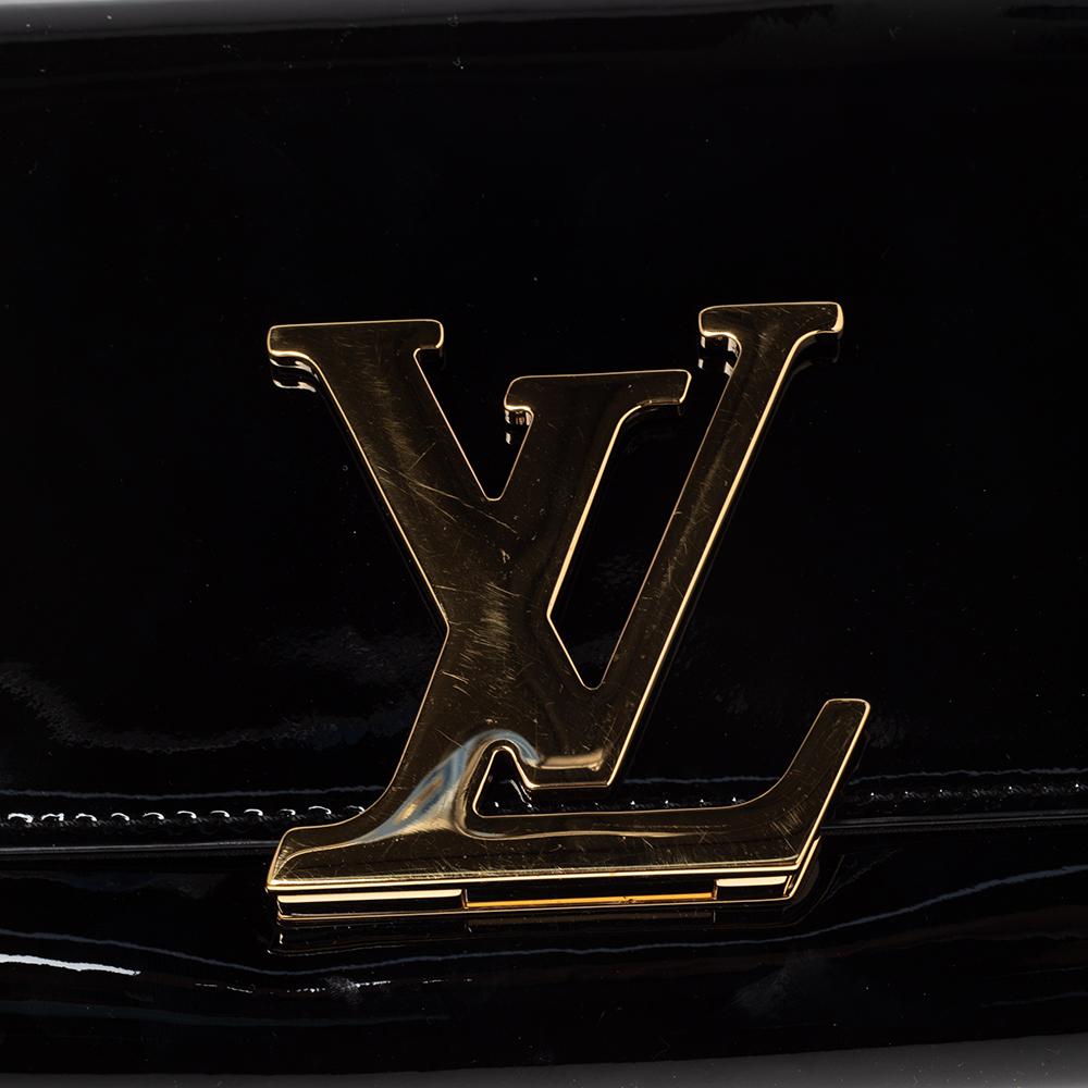 The Louise clutch from Louis Vuitton is as elegant as it can get. Designed in sleek black-hued patent leather, the clutch is beautiful. The iconic LV logo in gold-tone metal adorns the outer flap and the fabric interior makes it functional.